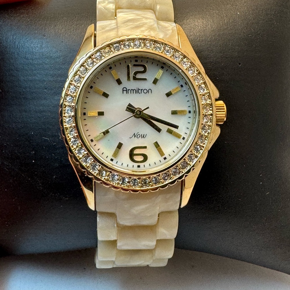 Women’s Armitron Now stylish dress watch beige marbled band gold ton 75–4064-H33